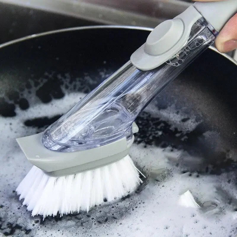 Long handled dishwashing brush with soap dispenser